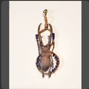 Unique Stag Beetle Pendant with Blue Accents